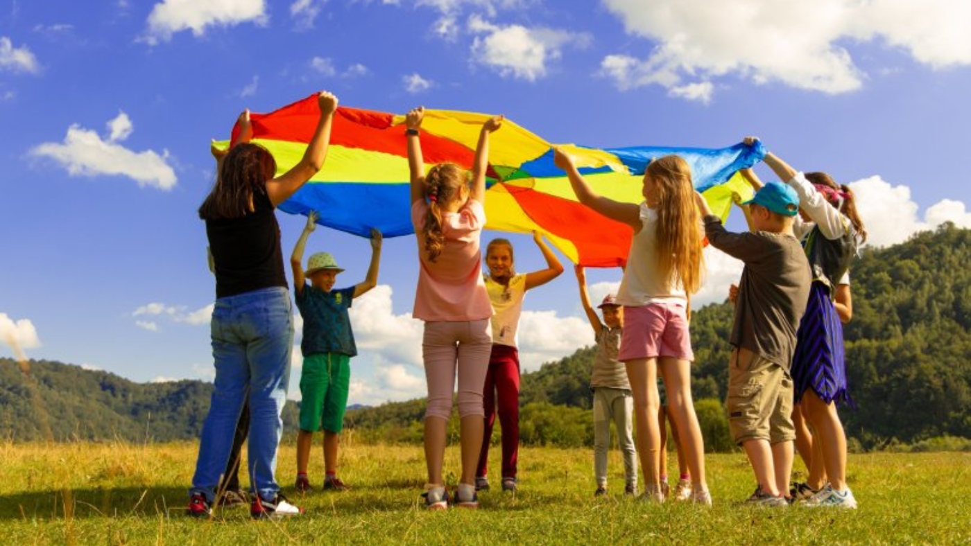 Children Waving a Big Kite